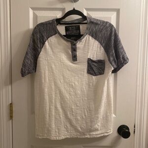 Short sleeve t with buttons. Washed and never worn.